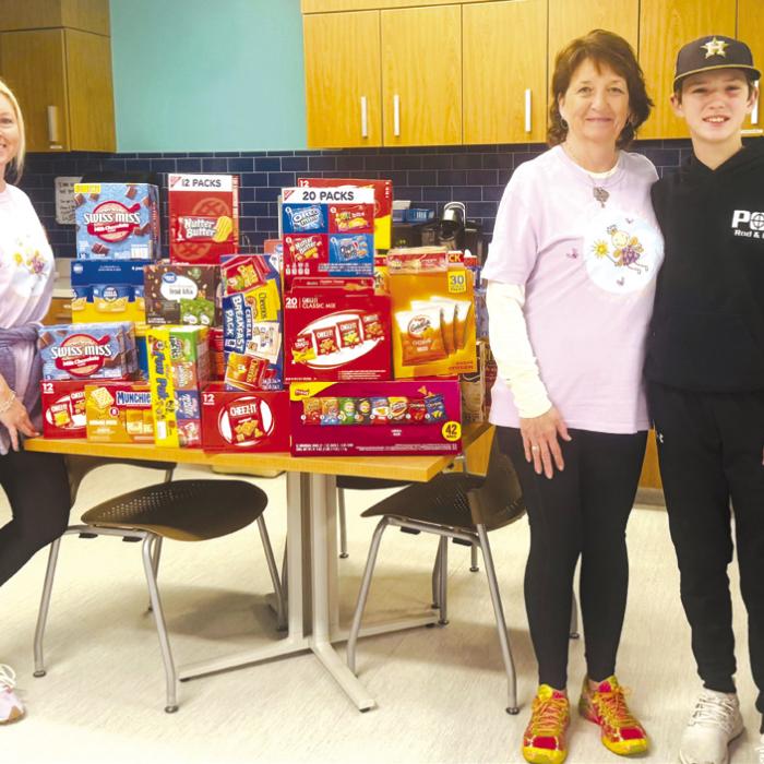 Presley’s Power was able to spread some Christmas joy recently with a special Christmas delivery to Dell Children’s Hospital. Many Christmas blankets, snacks and gift cards were delivered. Appreciation is extended to everyone who helps make these deliveries possible. Pictured are Marlana Wessels, Jackie Wessels and Kaine Fajkus.