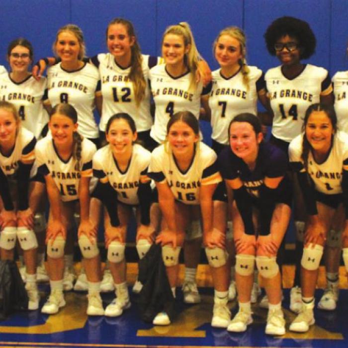 The La Grange girls pose after last week’s bidistrict round victory in Rockdale, but they were eliminated in area Saturday. Photo by Jeff Wick