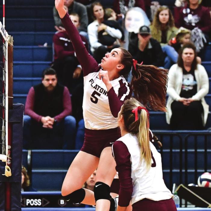 Camryn Smith pushes the ball over for the Flatonia Lady Bulldogs in Set 3 of Thursday’s match against Thrall in the area playoff round. Photo by Stephanie Steinhauser
