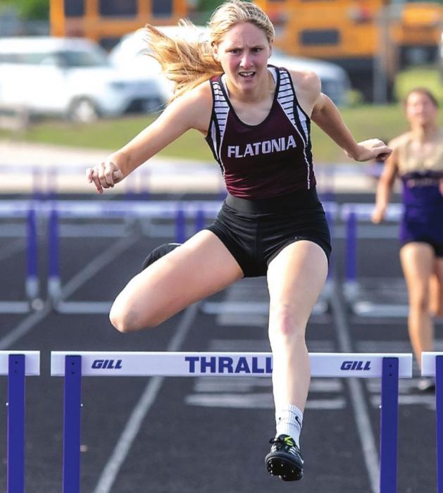 Mollie Mica earns first place for the Flatonia Lady Bulldogs at the Area track meet in the 300 meter hurdles Wednesday in Thrall. Photo by Stephanie Steinhauser