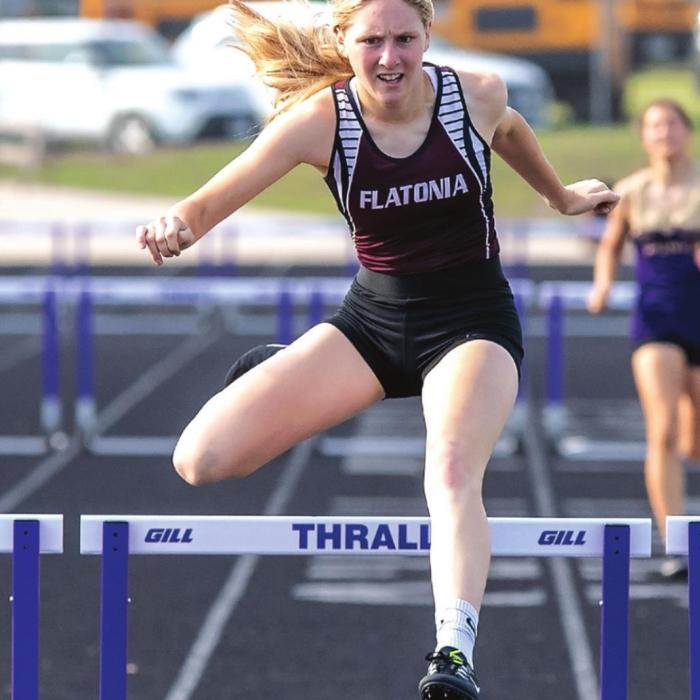 Mollie Mica earns first place for the Flatonia Lady Bulldogs at the Area track meet in the 300 meter hurdles Wednesday in Thrall. Photo by Stephanie Steinhauser