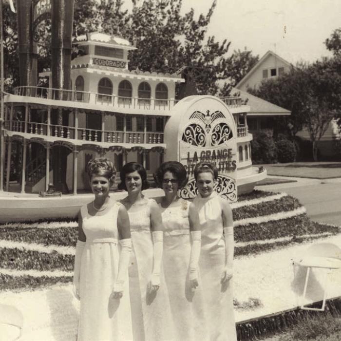 Fayette County Fair Parade – 1970: Photograph four young women standing, in white gowns, in front of the City of La Grange Utilities float. Left to right: Carolyn Liska, Jana Kulhanek, Barbara Hodde and Helen Frerichs. Photo taken September 5, 1970. Thank you to Rox Ann Johnson at the Fayette Heritage Museum and Archives for these pictures and information!