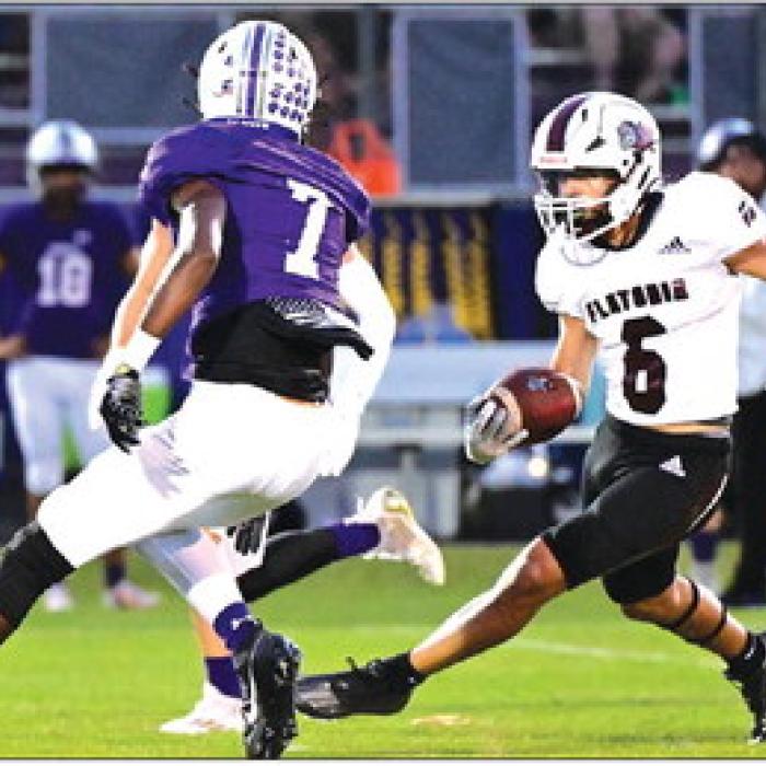 Caysen Perez works around Thrall defense to advance down to Tiger territory in Friday night’s district opener. Thrall defeated the Bulldogs. 28-21. Photo by Stephanie Steinhauser