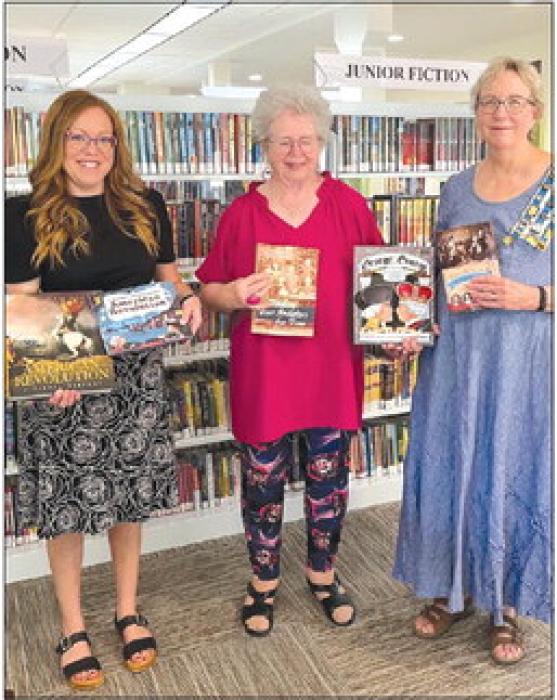 Pictured left to right: Allison MacKenzie, Director of the Fayette Public Library/Fayette Heritage Museum &amp; Archives; Jo Ann Vasina and Kim Joost.