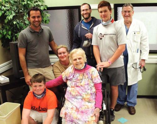 La Grange’s Josephine (Jo) White smiles surrounded by family members on her 100th birthday Monday. Next to her is great-grandson Shepherd, back row, left to right is Seth Gunn, husband of her granddaughter Mary, kneeling, grandson Scottson White, great-grandson Oliver Gunn and her son Dr. Daniel White. Photos by Jeff Wick