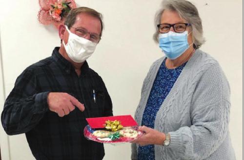 Tom Muras was recognized for his service on the NVCC Board of Directors by Glenda Stavinoha.