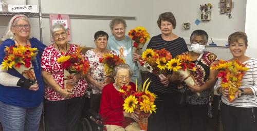 Artful Friday participants in Martha Beckmann’s Holiday Decorations Workshop pictured from left: Cheri Wilson, Cynthia Meyer, Julie Hill, Kathy Besetsny, Delores Bittner, Janice Collins, Martha Beckmann, and Irene Janda in front.