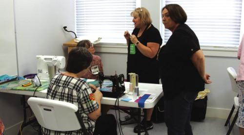 Glenda Wilder’s instructing at the “Quilting Around the World” Presentation on Tuesday, Aug. 22.