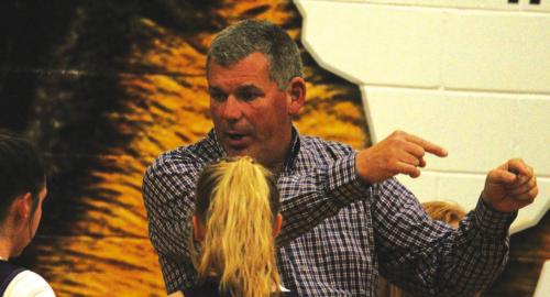 La Grange head coach Heath Golan talking to his players during Tuesday’s game. Photo by Jeff Wick
