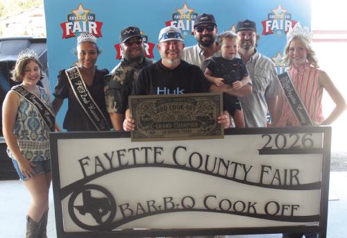 The team of Silver Bullet Cookers won Grand Champion at Saturday’s Fayette County Fair Bar-B-Q Cook Off. Left to right: Jr. Miss Fayette County Anabelle Zwahr, 2025 Queen second runnerup Keanna Henderson, Anthony Wessels, Trevor Erickson, head cook Brock Otto, Brant Otto, Charles Otto and 2025 Fair Queen Hailey Janish. Photos by Jeff Wick