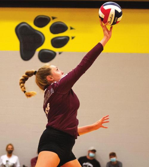 Carly Siptak guides the ball back over the net for the Flatonia Lady Bulldogs in last Friday’s match. Flatonia has won three of its last four matches. Photo by Stephanie Steinhauser
