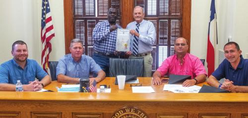 Fayette County Commissioners Court signed a proclamation last Thursday designating June 19 as Emancipation Day in Fayette County. On hand for the signing was Jonathan Ellis, president of the La Grange Juneteenth Committee. Pictured are (from left) Pct. 4 Commissioner Drew Brossmann, Pct. 3 Commissioner Harvey Berckenhoff, Ellis, County Judge Joe Weber, Pct. 2 Commissioner Luke Sternadel and Pct. 1 Commissioner Jason McBroom. Photo by Andy Behlen