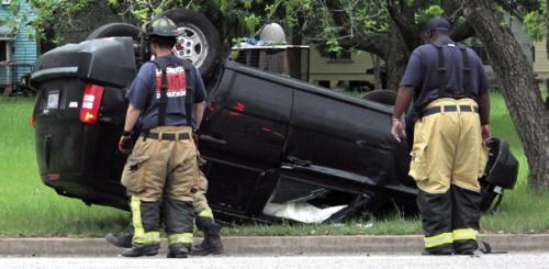 This scary scene looked worse than it was Sunday night when this west-bound Jeep collided with a south-bound Toyota pick-up that failed to yield the right of way at the intersection of Franklin and Live Oak Streets in La Grange across from the library. In the aftermath of the accident the Jeep, above, ended up upside down as responding La Grange firefighters arrived on the scene. No one was seriously injured. More details on the incident were not available at press time. Photo by Jeff Wick