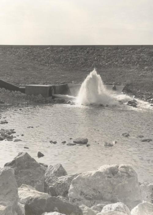 The first water reaches the cooling reservoir at Fayette Power Project in 1976.