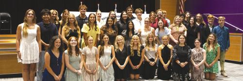 Monday’s new National Honor Society inductees join returning members for a group photo Monday. Photo courtesy of Lucy Carr