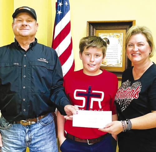 Pictured left to right is Roland Vacek, Nathan Vacek, and Jeannie Mican.