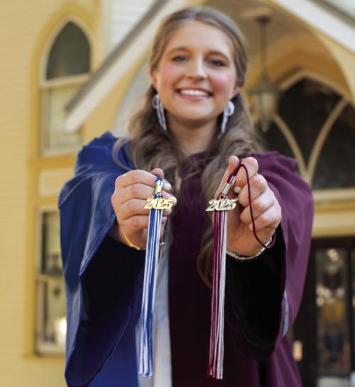 Reagan Moreau sporting both her Fayetteville maroon and Blinn blue.