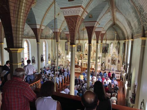 Bishop Brendan Cahill celebrated Mass Friday morning at St. Mary’s Church in Praha in front of a standing-room-only crowd that had some faithful finding benches up in the choir loft. Photos by Jeff Wick