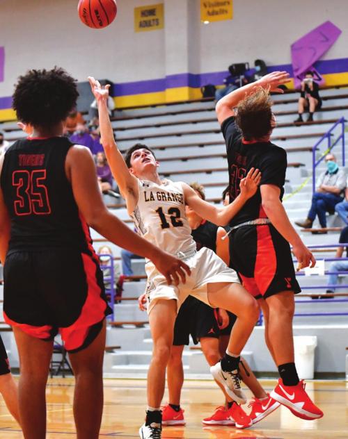 La Grange’s Caden Cooper throws up a shot against Smithville last week. Photo by Stephanie Steinhauser