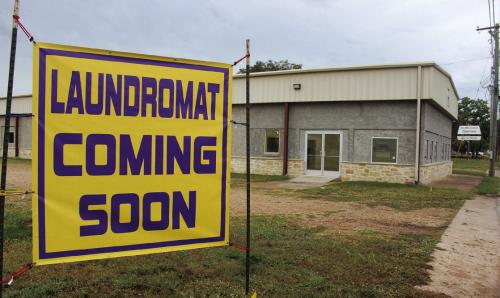 More than five years after Hurricane Harvey hit La Grange, signs of recovery continue. The old Second Chance Emporium building next to the KC Hall was significantly flooded. Johnny Oviedo said he plans to be able to open a laundromat in the middle of the building in early Dec. and has two retail spaces on either side of the laundromat he is renting out as well.