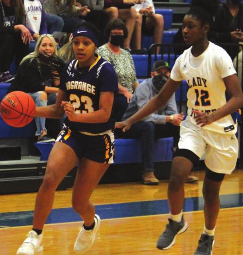 La Grange’s Ariel Thompson drives to the basket in Thursday’s playoff game in Georgetown. Photos by Jeff Wick
