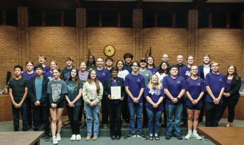 La Grange Mayor Jan Dockery signed a proclamation designating Nov. 25 as La Grange Leopards Marching Band Recognition Day. The Mighty Leopard Band made it all the way to the 4A State Marching Contest this year, which took place on Nov. 13. It was the first time for the La Grange Band to make it to the state contest. On hand for the proclamation signing at the City Council meeting Monday were directors and members of the Mighty Leopard Band. Staff photo by Andy Behlen