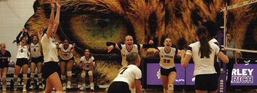 The members of the La Grange volleyball team celebrate after scoring a point in Friday’s match. Photos by Jeff Wick