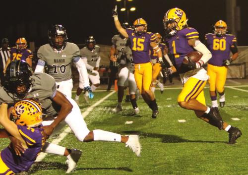 La Grange’s Kadyn Hall (No. 15) is already celebrating the score as Lep junior Bravion Rogers runs the football in for a touchdown Thursday. Photo by Darrell D. Gest