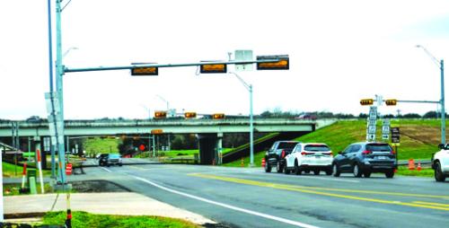 Traffic lights went up at the intersection of SH 159 and the Highway 71 Bypass in La Grange, the site of numerous accidents over the past few years.