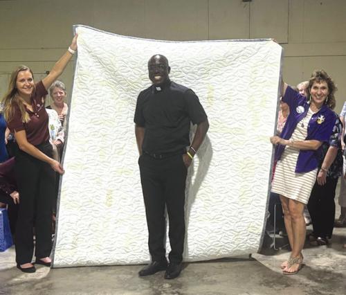 Fr. Felix Surprised With Handmade Quilt