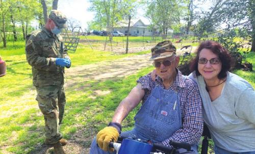 Leo Miller and his daughter Veronica Miller received COVID vaccines last Friday from one of the National Guard teams that delivered shots to the homebound. Photo by Andy Behlen