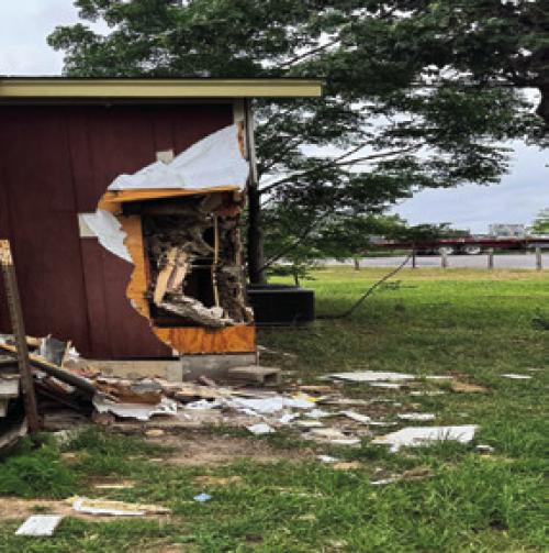 the damage to the Rek Hill house and the rogue tire.