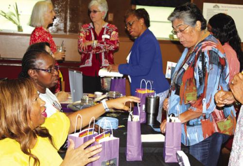 Packed House, Emotions Fill Woman to Woman Event