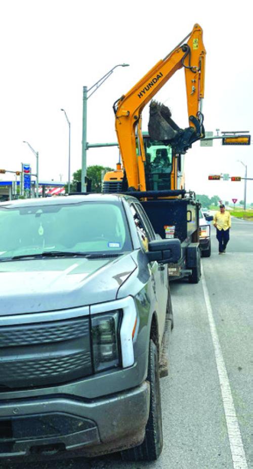 Pictured above is the pickup pulling the excavator that tore down multiple power lines between Rutersville and La Grange Tuesday morning.