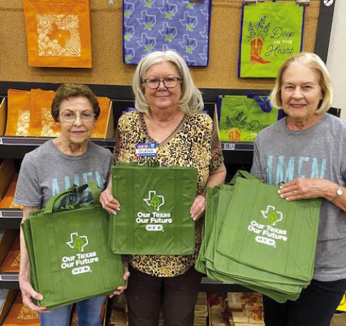 La Grange H-E-B donated 50 reusable bags to AMEN. Pictured left to right: Mary Vasek, AMEN board member; Diane Vollbaum, H-E-B Administrative Assistant; and Linda Oltmann, AMEN Board Member.