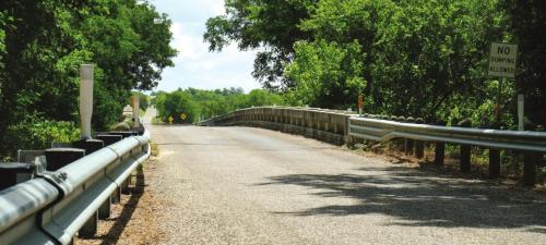The bridge across the East Navidad River on FM 1579 was built 100 years ago as part of the Old Spanish Trail Highway, which later became US Hwy. 90. Photo by Andy Behlen