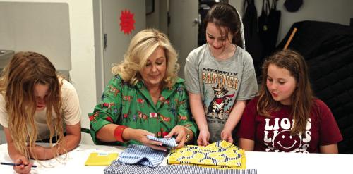 Cathy Hutton, second from left, a Houston and New Ulm-based interior designer known for her distinctive flair will be honored as the ARTS on the Runway Style Icon.