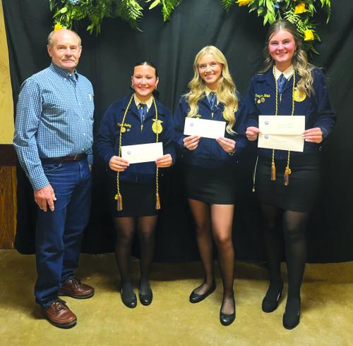 Schulenburg Young Farmers President Mark Vecera (left) presented three recipients with scholarships at the Schulenburg FFA banquet that was held on Thursday, May 8. Claire Oeding (second from left) and Olivia Mathis (second from right) received $1,500 each. Madyson Holub (right) received a $1,500 and $500 scholarship from Area XI Young Farmers, Schulenburg Chapter.