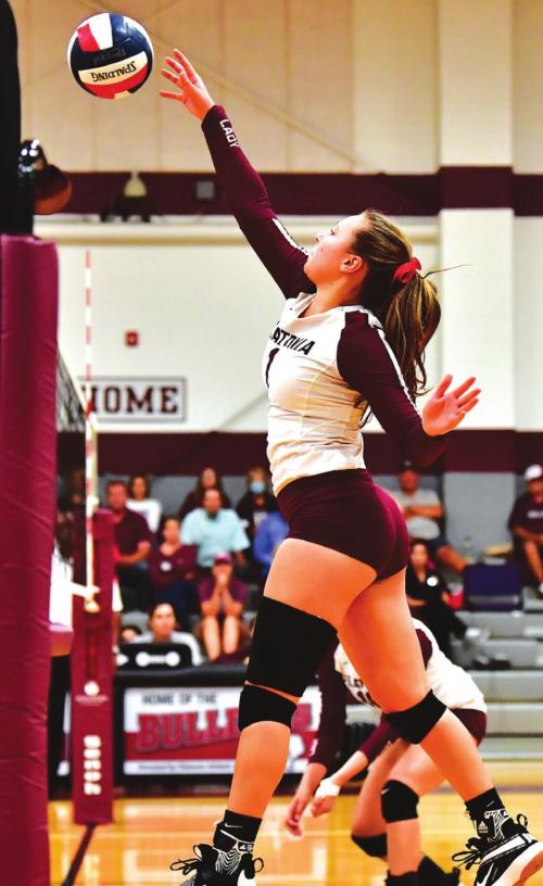 Ali Janecka guides the ball over the net for The Flatonia Lady Bulldogs in Tuesday night’s district thriller with Weimar. Photo by Stephanie Steinhauser