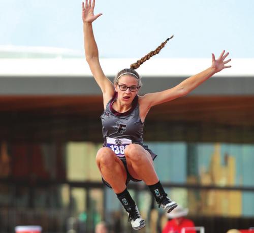 Fayetteville’s Brooklyn Jaeger is shown here leaping her way to fifth place in the long jump at state with a distance of 16-6.25. Photo by Scott Coleman