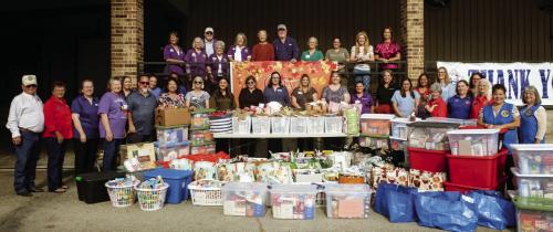 Tejas Health Care teamed up with local volunteers and community organizations to put on the 26th annual Thanksgiving basket drive in La Grange. Photo by Andy Behlen