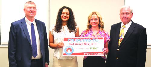 FEC General Manager/CEO Doug Lambert, left, and Board President Joseph Kruppa, right, congratulate Sophia Nance and Avery Nelius, both students from Round Top-Carmine High School, who won FEC’s 2025 Youth Tour contest and will represent FEC in Washington, D.C. in mid-June.