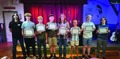 Camp attendees with their certificates of completion.