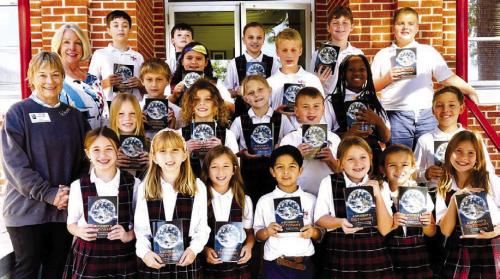 The Fayette County Republican Women organization visited the St. Rose of Lima Catholic School third grade class on Thursday, Nov. 14, and presented each student with a dictionary. The ladies briefly talked about how to find a word in the dictionary. They also showed the students how to use the book as a resource to learn a variety of facts, which will help them with their school subjects (math, science, social studies, and grammar), and real-life situations, such as, using sign language and braille.