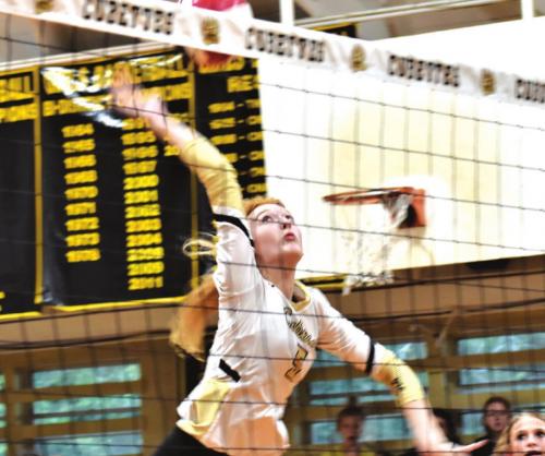 Round Top-Carmine’s Kaysie Ward spikes a ball in Friday’s victory over Richards. Photo by Paul Kipp