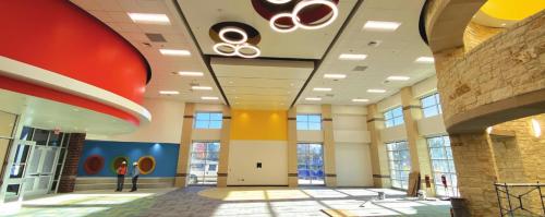 The only thing that’s still lacking from the almost finished library (above) in the new school are the books.