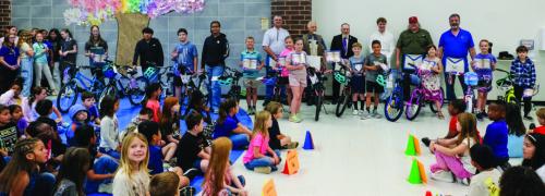 Last Friday, the La Fayette Masonic Lodge No. 34 of La Grange presented bicycles to the boy and girl in each class at La Grange Elementary who improved the most in reading. Those students were: First Grade - Linken Farris and Kennedy Zarosky, Second Grade - Austin Rhodes and Hannah Mash, Third Grade - Waylon Hayes and Jana Corder, Fourth Grade - Keigan Lambert and Coral Hrbacek, Fifth Grade - Mitchell Cherry and Kayla Moore, and Sixth Grade - Christopher Angel and Rylee Covin. Photo by Andy Behlen