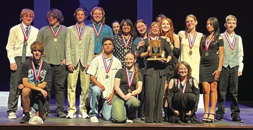 The La Grange High School One-Act Cast and Crew pose on the stage Thursday in Caldwell are learning they advanced to Bi-District.