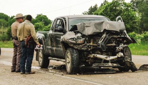 A Toyota Tacoma pickup, pictured above, had to be towed from the scene after running into the back of a vacuum truck on US 77 north of La Grange Monday morning. Photo by Andy Behlen
