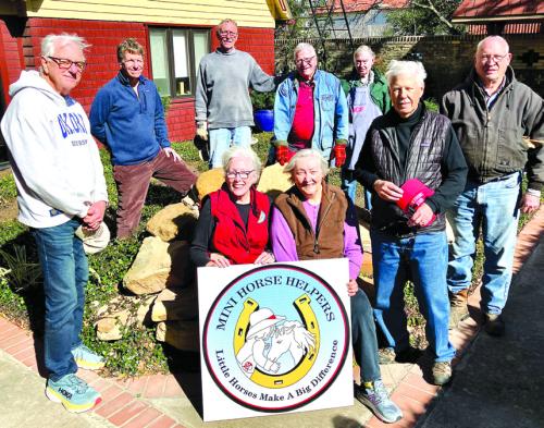Saturday’s Holy Smokers cooked for the Mini Horse Helpers. Pictured seated is Sally Van Duyn and Debbie Irwin of Mini Horse Helpers; standing (from left) Dan Boyles, Ed Dykes, Paul Crane, Weldon Koenig, “Trey” Cheatham, John McLean, and Jim Austin.